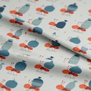 May include: A light-colored fabric featuring a repeating pattern of cartoon ants carrying blue sacks and jars. The ants are orange with black legs and antennae. The sacks and jars are various shades of blue. Small white star shapes are scattered throughout the design.