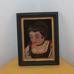 Antique vintage reverse glass hand painting woman portrait with wood frame .