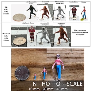 May include: A comparison of different scale figures of various characters, including Santa Claus, a Sasquatch, and an abominable snowman. The figures are shown next to US quarter coins to illustrate their size. The text "HO O --SCALE" is shown below the figures, with measurements in millimeters.