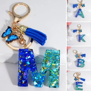 Llavero de resina con letras, regalos brillantes para su regalo de Navidad, llaveros con iniciales de flor de océano azul, regalo surtido, llavero de resina, cumpleaños