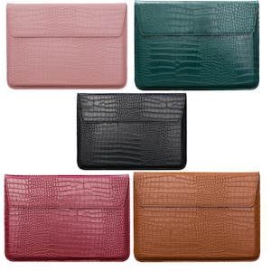 May include: Five laptop sleeves in different colors: pink, green, black, burgundy, and brown. Each sleeve has a crocodile-embossed texture and a flap closure.