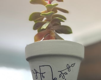 Small Hand Designed Clay Pot