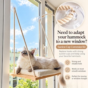 May include: A cat window hammock featuring a wooden platform with a white cushion, suspended by thick beige ropes attached to clear suction cups on a window. Text reads: Need to adapt your hammock to a new window? Suction Cup Conversion Kit.