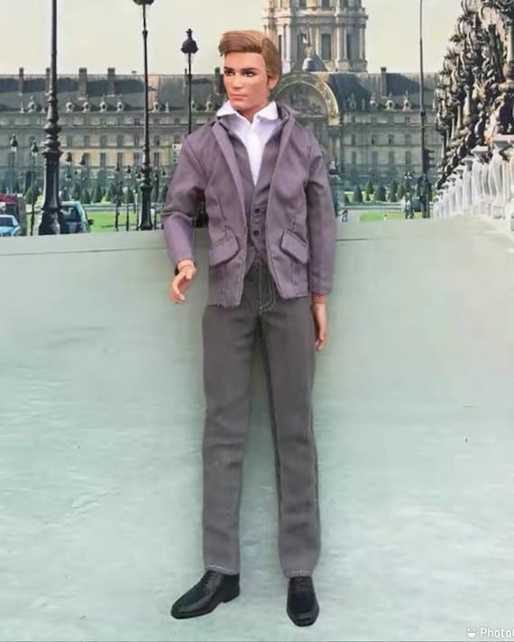 ken barbie doll in suit