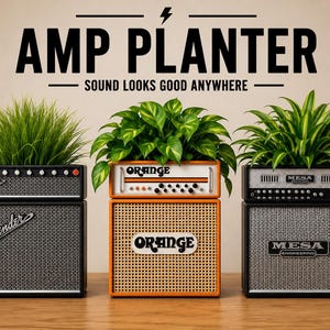 May include: Three planters shaped like guitar amplifiers, labeled Fender, Orange, and Mesa Engineering, each containing a green plant. The text AMP PLANTER and SOUND LOOKS GOOD ANYWHERE appears above the three units in black lettering.