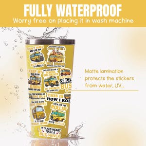 May include: A yellow stainless steel tumbler with a variety of colorful stickers featuring school bus illustrations and humorous text about being a bus driver. The text on the stickers includes "Don't make me use my voice", "Keep my bus clean", "Once you become a school bus driver", "Captain of the struggle bus", "The wheels on the bus go round and round", "This is how I roll", "They see me rollin", "It takes heart to be a bus driver".