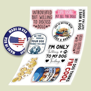 May include: A set of 10 dog-themed stickers featuring various sayings and illustrations. The stickers are printed on white paper with a glossy finish. Some of the sayings include "Life Goal: Pet All The Dogs", "I'm Only Talking To My Dog Today", and "My Dog Thinks I'm Cool".