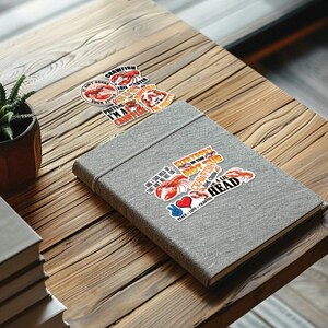 May include: A set of colorful stickers featuring crawfish with various sayings, including "Everybody in the Hot Tub Crawfish", "I'm a Crawfish", and "Peace, Love, Crawfish".