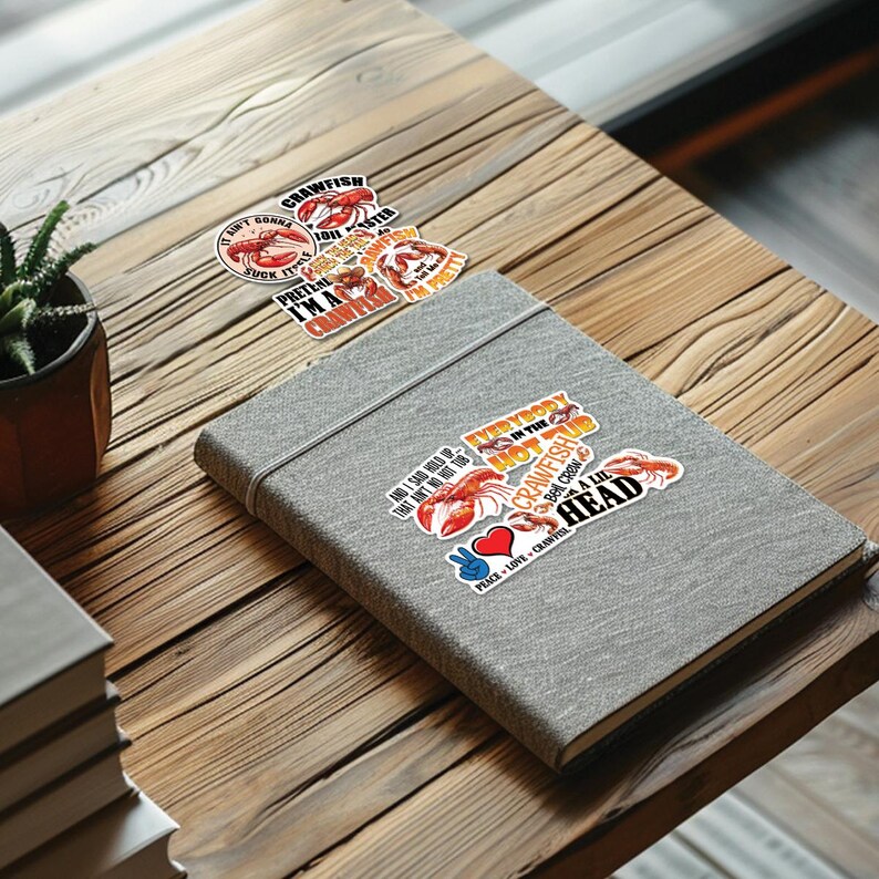 May include: A set of colorful stickers featuring crawfish with various sayings, including "Everybody in the Hot Tub Crawfish", "I'm a Crawfish", and "Peace, Love, Crawfish".
