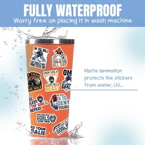 May include: An orange insulated tumbler with hockey-themed stickers. The stickers feature phrases like "I'm the Wall" and "My Goal is to Deny Yours." The tumbler is fully waterproof and has matte lamination to protect the stickers.