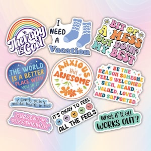 May include: Set of ten colorful stickers with positive affirmations and quotes. The stickers feature a variety of designs, including hearts, stars, and flowers. Some of the quotes include "Therapy is Cool", "The World is a Better Place with You in It", "It's Okay to Feel All the Feels", and "What if it All Works Out?"