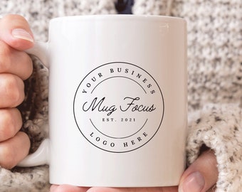 May include: White ceramic mug with a black circle logo that says "Your Business Mug Focus Est. 2021 Logo Here"