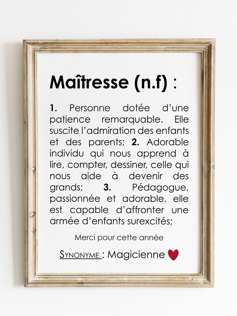 May include: A framed print with a black and white text definition of the word "Ma&icirc;tresse" in French. The text describes the qualities of a teacher, including patience, kindness, and the ability to inspire children. The print includes a red heart symbol.