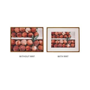 Side-by-side comparison of a red fruit still-life print displayed without a mat and with a wide white mat in a warm-toned wood frame.