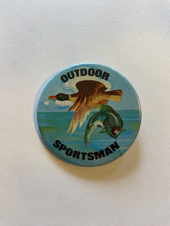 Vintage button, “outdoor sportsman”