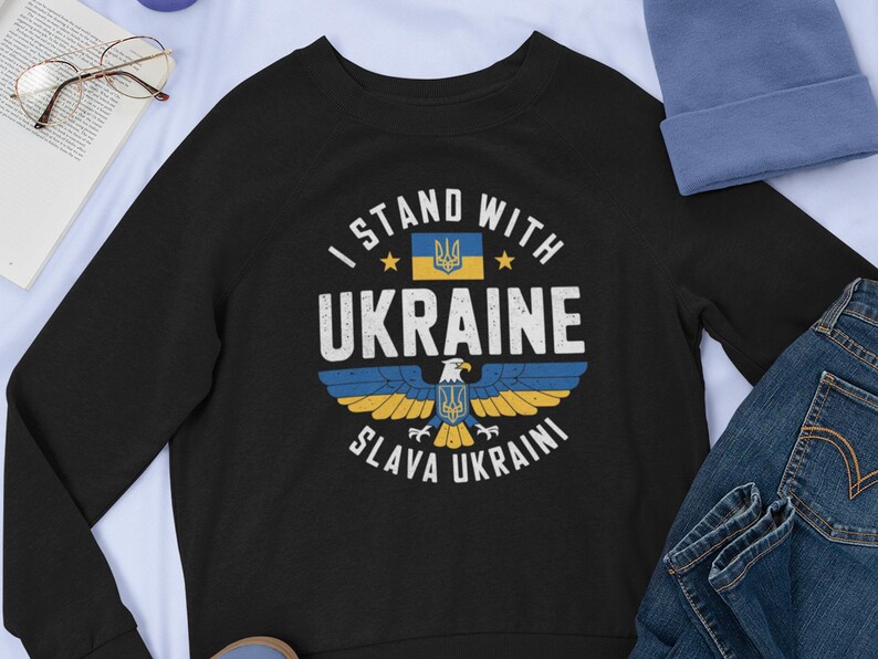 A sweatshirt mockup, showing a black shirt, with the Ukraine Eagle design on the front.