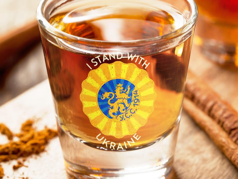 A mockup of the Ukrainian Sich design on a shot glass.