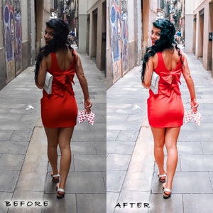 May include: A woman in a red dress walks down a street with a white clutch bag and a red and white patterned clutch in her hand.