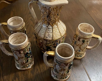 Vintage set German Stein’s and pitcher