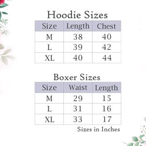 May include: A chart displaying hoodie and boxer sizes in inches. The hoodie sizes include length and chest measurements for sizes M, L, and XL. Boxer sizes include waist and length measurements for sizes M, L, and XL. Floral accents frame the chart.