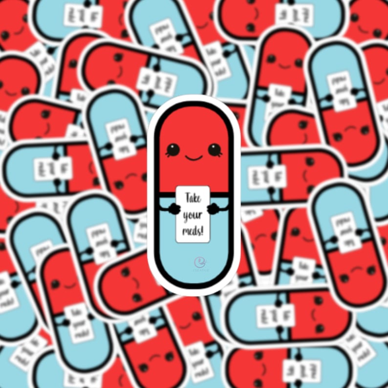 Image shows scattered stickers. Sticker is a red and blue pill with a kawaii face. It is holding a sign saying TAKE YOUR MEDS! There is a small white offset around the sticker.