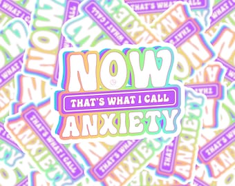 May include: A sticker with a rainbow gradient design that says "NOW THAT'S WHAT I CALL ANXIETY" in white letters.