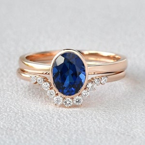 1.25 CT Oval Cut Sapphire Gemstone Ring Set, Bezel Set Solitaire Engagement Ring, Yellow Gold Bridal Set, Round Diamond Curved Wedding Band