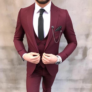 Mehroon coat pant with top black shirt