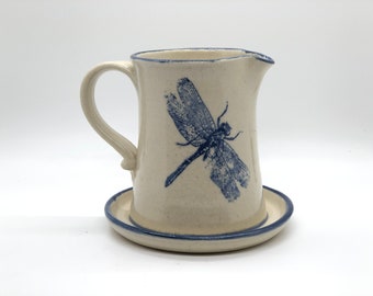 Pitcher with bufferflys and dragonfly's