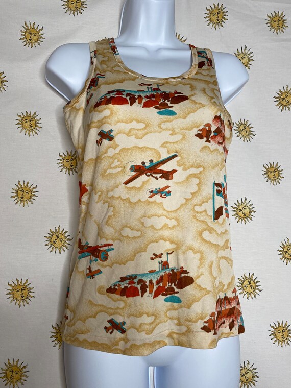 1970s people and airplane print tank top