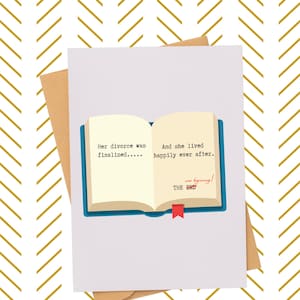 Op de afbeelding: Een wenskaart met een witte achtergrond en een gouden chevronpatroon. De kaart toont een illustratie van een open boek met de tekst "Her divorce was finalized... And she lived happily ever after. new beginning! THE END."