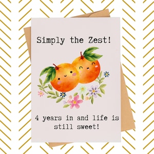 May include: Greeting card with the text "Simply the Zest!" and "4 years in and life is still sweet!" features two orange cartoon oranges with smiling faces, green leaves, and floral accents. The card is on a white background with a brown envelope.