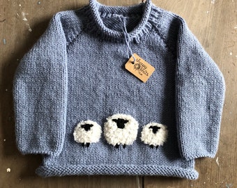 The Sheepy hand knitted baby jumper size 6-12 months pale denim with embroidered sheep motif