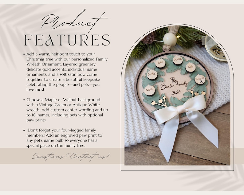 May include: A circular wooden Christmas ornament featuring a green wreath design, a white satin bow, and small wooden discs engraved with names. The centre displays the text The Baxter Family 2026. The ornament includes a hanging loop with a wooden bead.
