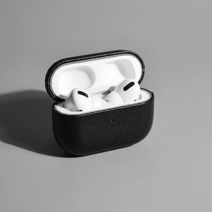 Black Leather Airpods 4 Case Modern Aesthetic Black Premium Quality Tech Accessory Protection Genuine Material Durable Construction Stylish Look Everyday Use