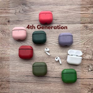 May include: A collection of silicone cases for 4th Generation earbuds in various colours including red, pink, dark green, olive green, purple, and white, alongside two white wireless earbuds. The text 4th Generation is printed in brown.