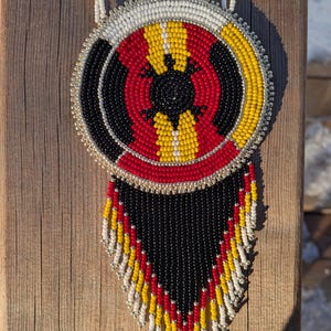 May include: A set of three ceramic mugs with a speckled, matte finish. The mugs are in shades of cream, light grey, and dark grey. Each mug has a simple, minimalist design, ideal for coffee or tea.