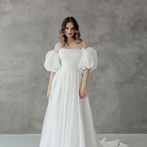 Brautkleid mit Puffärmeln. Leichter Organza Stoff. Lange Schleppe. Brautkleid plus Größe.