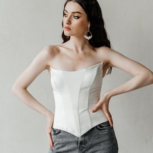 Corset. Fashionable corset top. Lacing on the back. Satin corset.