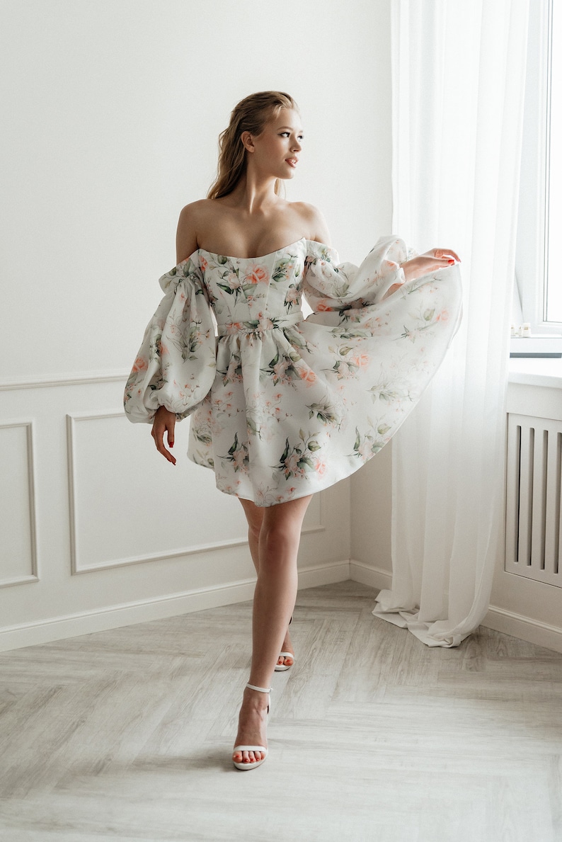 short dress. mini wedding dress with long sleeve. short wedding dress. floral print wedding dress. wedding dress. evening dress.