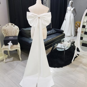 Bow.  Removable bow for wedding dress