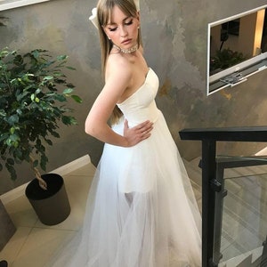 short wedding dress with bow. Mini wedding dress. wedding dress. Puffy sleeve. dress with a long train. ewening dress. VIOLA s image 5