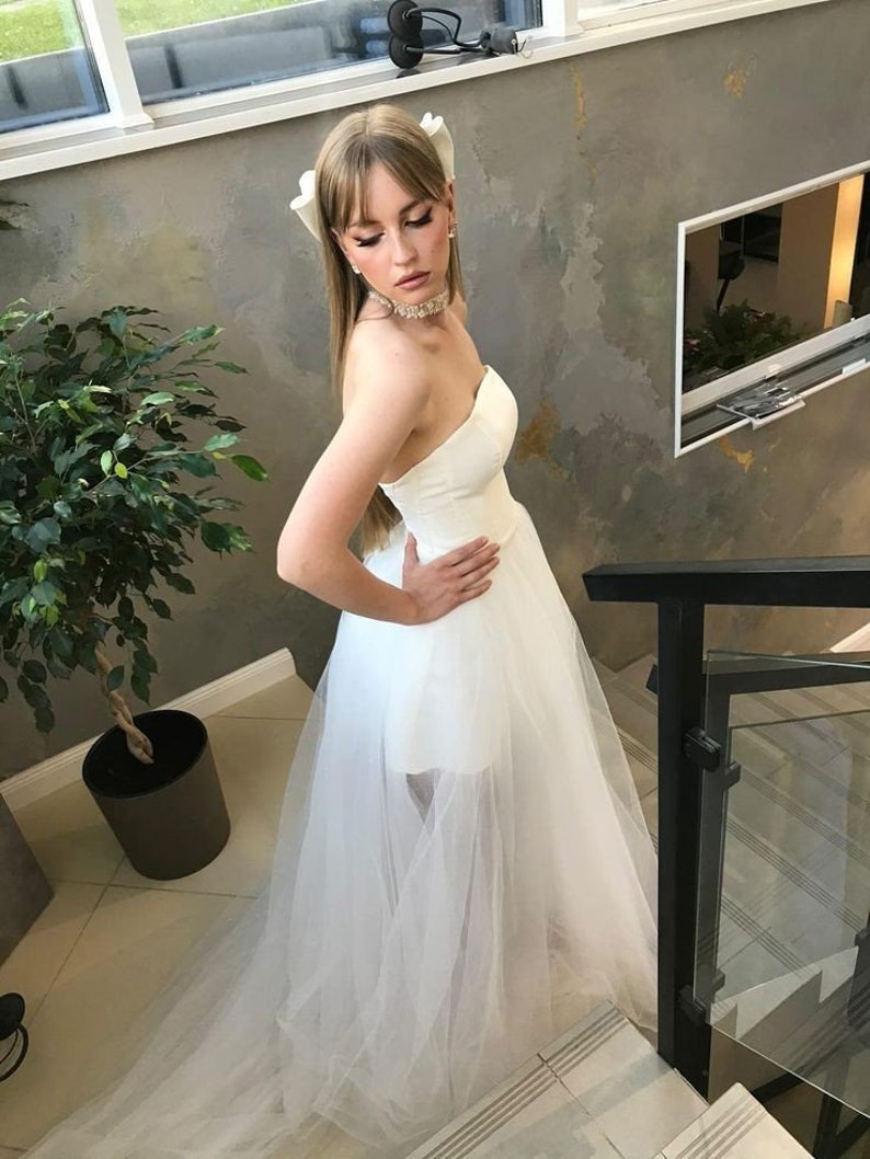short wedding dress with bow. Mini wedding dress. wedding dress. Puffy sleeve. dress with a long train. ewening dress. VIOLA s image 5