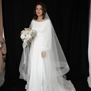 Wedding dress simple. Wedding dress with long sleeve. Wedding dress. Minimal wedding dress. Nodern wedding dress. Boho wedding dress.