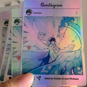 May include: Holographic cards featuring a character illustration with a harp, wings, and a stylized background. The cards have text that reads "Genstagram" and "Venti Ehe". The cards are iridescent with a rainbow effect.