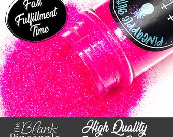 May include: A close-up of a pink glitter jar with the text "Pineapple Glitter" and "#101" on the label. The glitter is spilling out of the jar onto a white surface. The text "Fast Fulfillment Time" is in a black circle in the top left corner of the image. The text "High Quality Polyester Glitter" is in a black rectangle at the bottom of the image.