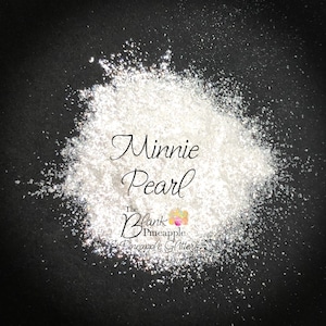 May include: A close-up of a white glitter, called "Minnie Pearl", from The Blank Pineapple & Pineapple Glitters.