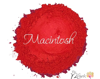 Può includere: Primo piano di un pigmento in polvere rosso etichettato "Macintosh" di The Blank Pineapple & Pineapple Glitters.