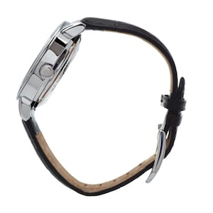 May include: A silver-toned wristwatch with a black leather band. The watch face is round, and the band is secured with a silver buckle. The watch is shown from a side angle, highlighting the details of the case and strap.