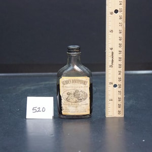 Antiek/vintage origineel plotseling ongemak fles van 1 3/4 ounce met origineel deksel (520)